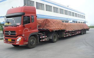 运输50装载机一公里多少钱？